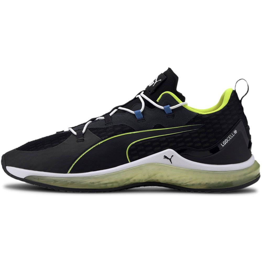 puma black and yellow sports shoes