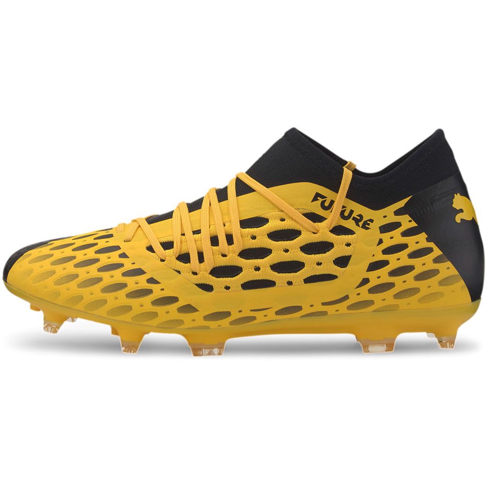 black and yellow puma shoes